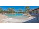 Community pool with lounge chairs at 109 Tierra Verde Way, Bradenton, FL 34212