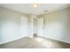 Bright bedroom with wood-look flooring and ample closet space at 1502 10Th W St, Bradenton, FL 34205