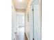 Bright hallway with light walls and wood-look floors at 1502 10Th W St, Bradenton, FL 34205