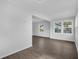 Light-filled living room with hardwood floors and large windows at 1502 10Th W St, Bradenton, FL 34205