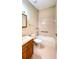 Bathroom with shower/tub combo and pink tile at 2105 Vickery Ln, Dover, FL 33527