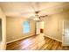 Bedroom with hardwood floors and ceiling fan at 2105 Vickery Ln, Dover, FL 33527