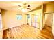 Spacious bedroom featuring wood-look floors and ample natural light at 2105 Vickery Ln, Dover, FL 33527