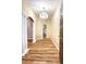 Bright entryway with hardwood floors and columns at 2105 Vickery Ln, Dover, FL 33527