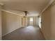 Bedroom with carpet, ceiling fan and window at 37921 Tiffany Rd, Dade City, FL 33525