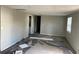 Under construction room with debris on the floor at 5117 Behms Ct, Port Richey, FL 34668