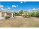 Large backyard with screened porch and shed at 4944 Alseir Rd, North Port, FL 34288