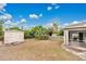 Private backyard with shed and screened porch at 4944 Alseir Rd, North Port, FL 34288