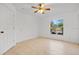 Well-lit bedroom with window and a view of the outdoors at 4944 Alseir Rd, North Port, FL 34288