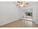 Bedroom with sliding glass doors leading to a patio at 4944 Alseir Rd, North Port, FL 34288