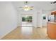 Spacious dining area with sliding glass doors leading to the backyard at 4944 Alseir Rd, North Port, FL 34288