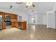Open floor plan showing kitchen with island and living area at 4944 Alseir Rd, North Port, FL 34288