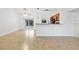 Open concept living room with tile flooring and access to the patio at 4944 Alseir Rd, North Port, FL 34288