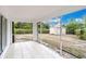 Spacious screened-in porch overlooking the backyard at 4944 Alseir Rd, North Port, FL 34288