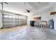 Garage with utility space and storage shelving at 7864 Jayman Rd, North Port, FL 34291