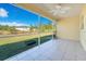 Spacious screened lanai overlooking the backyard at 7864 Jayman Rd, North Port, FL 34291
