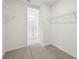 Large walk-in closet with wire shelving and carpet flooring at 14109 Gunnison Cv, Parrish, FL 34219