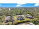 Aerial view showcasing houses and surrounding landscape at 14248 Salvatierra Ln, Port Charlotte, FL 33981