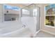 Bathroom with soaking tub and separate shower at 14248 Salvatierra Ln, Port Charlotte, FL 33981