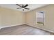 Bright bedroom with ceiling fan and vinyl flooring at 14248 Salvatierra Ln, Port Charlotte, FL 33981