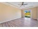 Main bedroom with sliding glass doors to backyard at 14248 Salvatierra Ln, Port Charlotte, FL 33981