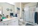 Clean bathroom with a shower/tub combo and updated vanity at 210 3Rd W St # 8205, Bradenton, FL 34205