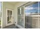 Private patio with sliding glass door and window at 210 3Rd W St # 8205, Bradenton, FL 34205