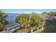 Scenic waterfront view with lush greenery and a gazebo at 210 3Rd W St # 8205, Bradenton, FL 34205