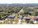 Aerial view showcasing the neighborhood and surrounding area at 2315 Snowflake Ln, North Port, FL 34286