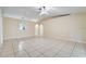 Spacious living room with tile flooring and vaulted ceiling at 2315 Snowflake Ln, North Port, FL 34286