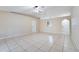 Spacious living room with tile flooring and vaulted ceiling at 2315 Snowflake Ln, North Port, FL 34286