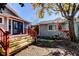 Backyard with wooden deck, steps, and shed at 7108 N 10Th St, Tampa, FL 33604