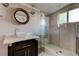 Clean bathroom with a walk-in shower and tiled walls at 7108 N 10Th St, Tampa, FL 33604