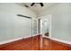 Spacious bedroom with hardwood floors and built in shelving at 7108 N 10Th St, Tampa, FL 33604