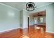 Hardwood floors and an open floor plan in this spacious dining area at 7108 N 10Th St, Tampa, FL 33604