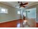 Hardwood floor living room with access to other rooms at 7108 N 10Th St, Tampa, FL 33604