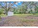 Spacious backyard with a large shed at 7495 Mitchell Rd, Brooksville, FL 34601