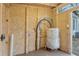 Unfinished utility room with water heater at 7495 Mitchell Rd, Brooksville, FL 34601