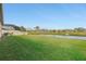 Spacious backyard backing up to a pond at 8796 Little Bluestem Dr, Land O Lakes, FL 34637