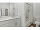 Modern bathroom with double vanity and a bathtub at 8796 Little Bluestem Dr, Land O Lakes, FL 34637