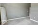 Spacious bedroom with grey walls and carpeted floors at 8796 Little Bluestem Dr, Land O Lakes, FL 34637