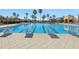 Competition-ready lap pool with starting blocks at 8796 Little Bluestem Dr, Land O Lakes, FL 34637