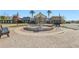 Community town square with charming shops and a central fountain at 8796 Little Bluestem Dr, Land O Lakes, FL 34637