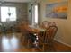 Dining area with a wood table, chairs, and hardwood floors at 1000 Osceola Blvd, Englewood, FL 34223