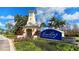 Mira Bay community entrance with a charming gatehouse and landscaping at 1003 Signet Dr, Apollo Beach, FL 33572