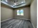 Bedroom featuring recessed lighting, a window, and gray wood-look floors at 1504 Kohlenberg Ave, North Port, FL 34288