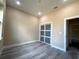 A virtually staged empty bedroom showcasing recessed lights and a sliding closet door at 1504 Kohlenberg Ave, North Port, FL 34288