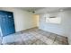 Condo entryway with blue door and tiled floor at 7120 Waterside Dr # 34, Tampa, FL 33617