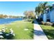 Lakeside walkway offering tranquil views of the water and community at 7120 Waterside Dr # 34, Tampa, FL 33617