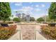 Tranquil community park featuring a fountain and memorial at 718 New York St, Clearwater, FL 33756